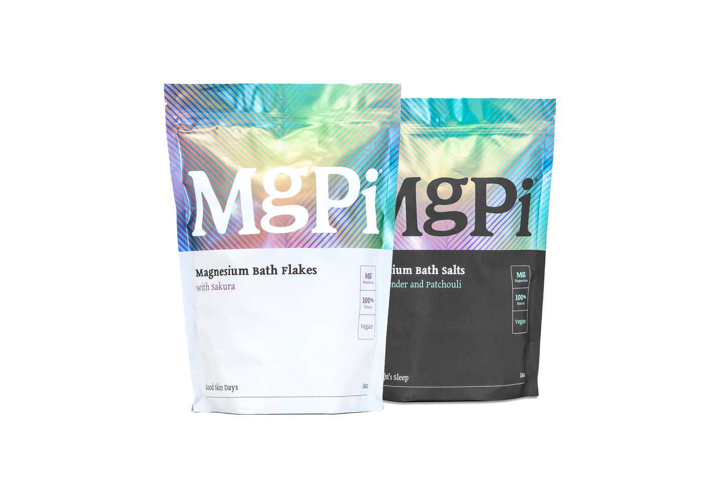 Multiple pack of MgPi magnesium bath salts and flakes products on a white background