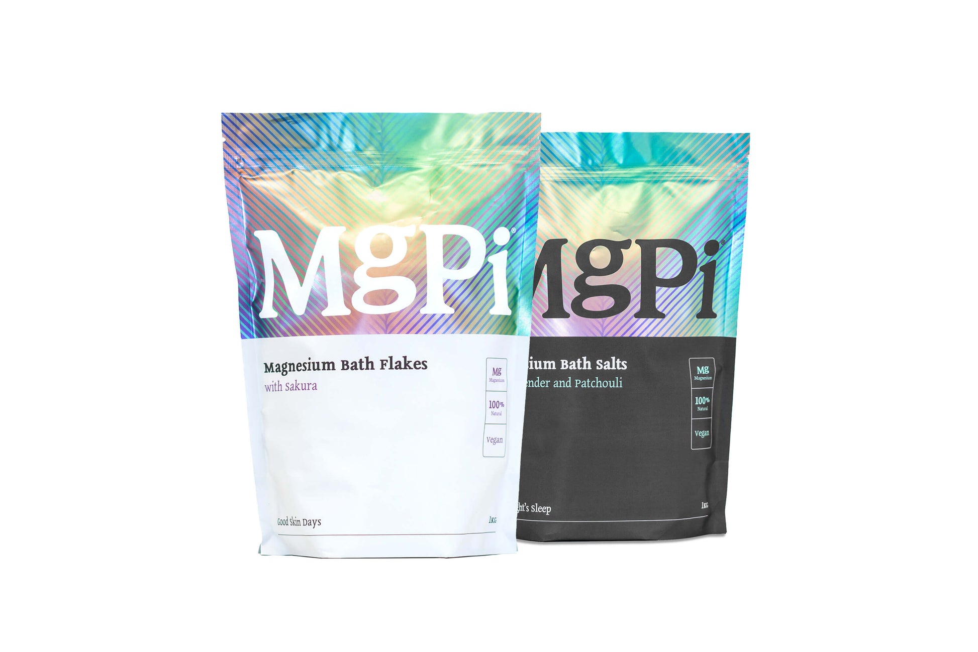Multiple pack of MgPi magnesium bath salts and flakes products on a white background